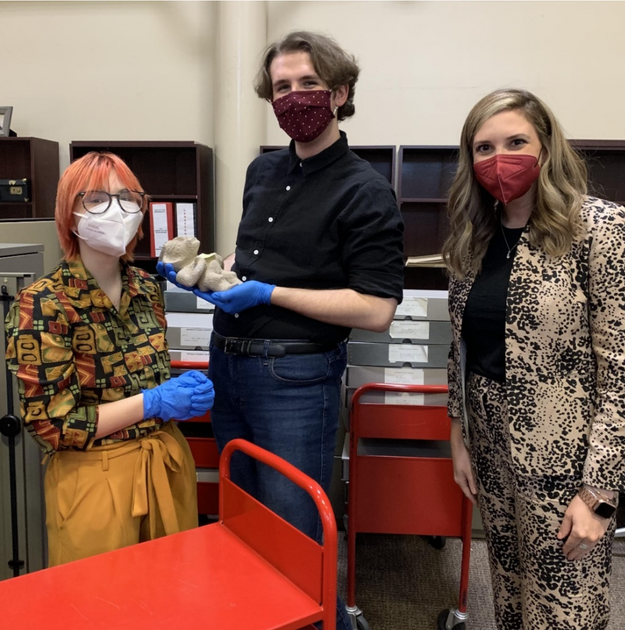 WVU Undergradate students Riley “Red” Klug (left) and Samuel Hensley (center) with Teaching Assistant Professor of Art History Megan Leight (right), 