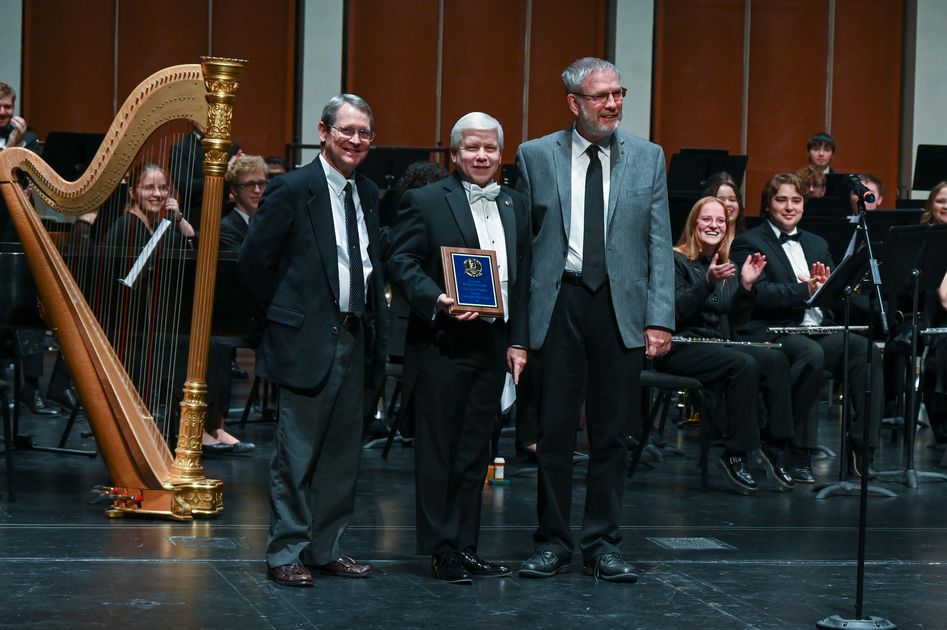 Scott Tobias (middle) receives the 2024 WV Bandmaster of the Year Award from Mark Hardman (left) and John Hendricks (right)