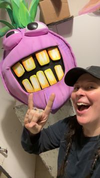 Chelsea with another large puppet taking a selfie.