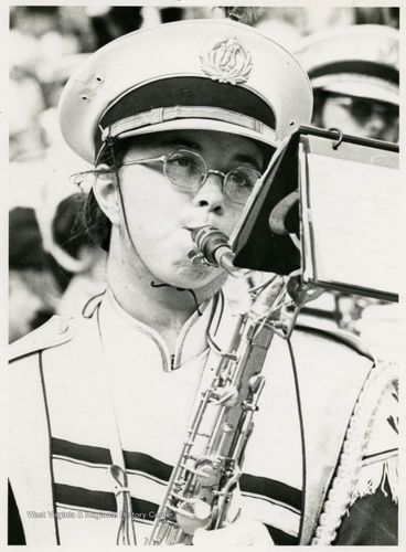 a WVU band member performs during a 1972 football game