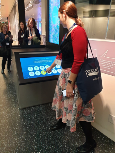 Heather Harris uses interactive display during Fulbright Seminar