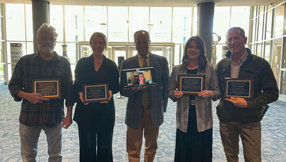 faculty award winners stand with Dean Keith Jackson