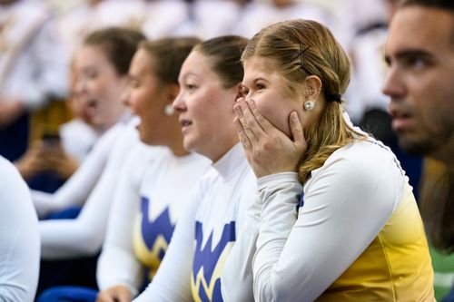 Junior color guard member Abigail Judy reacts to the Saturday (Sept. 16) announcement that the Mountaineer Marching Band will participate in the 2024 Macy's Thanksgiving Day Parade.